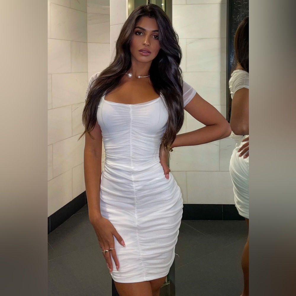 Sexy white dress! Ruched and figure flattering.